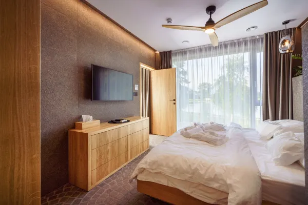 interior-of-modern-bedroom-suite-in-luxury-hotel-2024-10-21-09-45-08-utc-69158b570a607